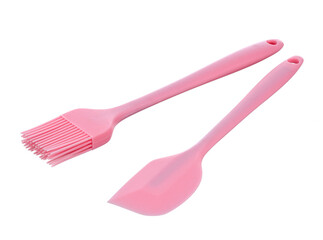 Kitchen spatula and brush made of soft pink heat-resistant silicone, insulated on a white background. Modern kitchen tools.