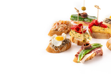 Assortment of Spanish pintxos isolated on white background. Copy space