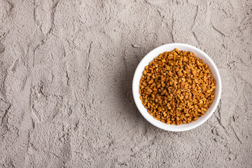 Organic fenugreek seeds in the bowl. Trigonella foenum-graecum