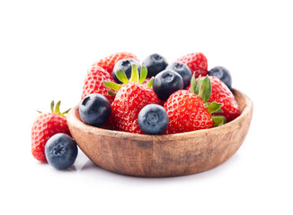 Strawberries with blueberries on white backgrounds.