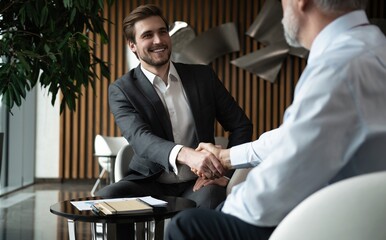 Business partnership meeting in office. Pleased to meet you.