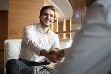 Business partnership meeting in office. Pleased to meet you.