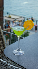 Green cocktails serving on the restaurant table