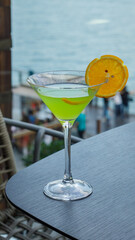 Green cocktails serving on the restaurant table