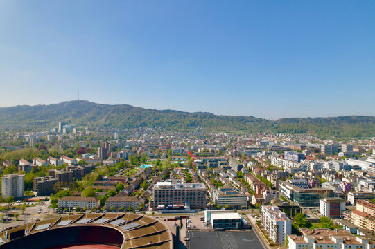 Aerial view of City of Z&uuml;rich on a sunny spring day with blue cloudy sky background. Photo taken April 28th, 2022, Zurich, Switzerland.