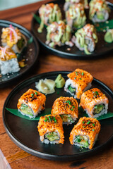 Sushi lifestyle images on the table using a chopstick 