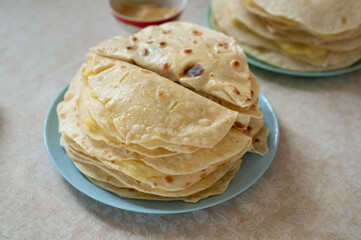 Qistibi - popular traditional dish in Tatarstan, Bashkortostan and Chuvashia. Roasted flatbreads with mashed potato fillings