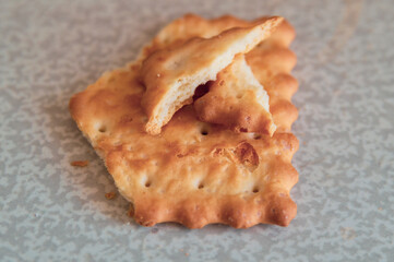 pieces of cracker on the table