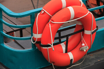 red life buoys on board the ship