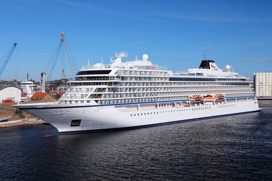KRISTIANSAND, NORWAY - JULY 31, 2020: Viking Jupiter cruise ship in Kristiansand harbor, Norway. The cruise ship was built in famous Italian shipyard Fincantieri.