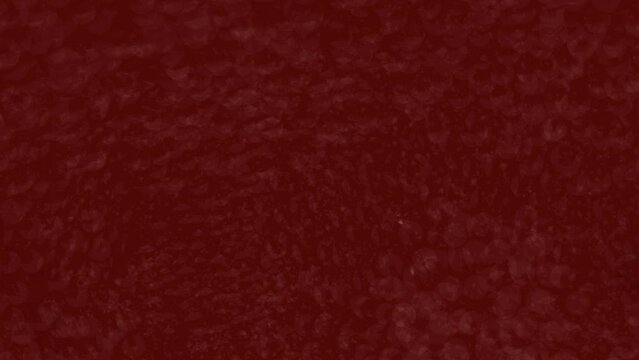Scarlett moving background. Flowing on red gradient background with bokeh