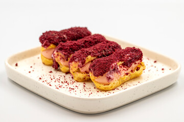 Raspberry eclair cake. Eclair cake with raspberry filling on a white background. close up