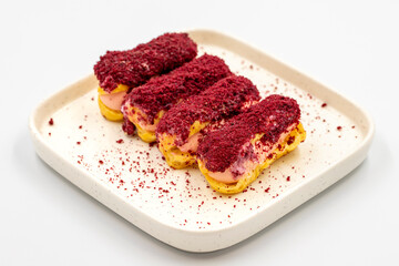 Raspberry eclair cake. Eclair cake with raspberry filling on a white background. close up