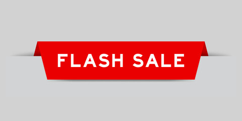 Red color inserted label with word flash sale on gray background