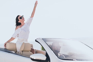 Photo of sweet carefree husband wife wear casual clothes riding cabriolet going vacation outside...