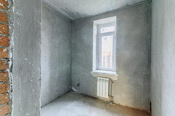 Russia, Moscow- May 21, 2020: interior apartment rough repair for self-finishing. interior decoration, bare walls of the room, stage of construction