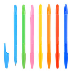 Multicolored pens isolated on white background. Ballpoint pens lie on white