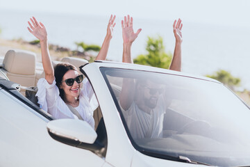 Photo of funny impressed boyfriend girlfriend dressed casual outfit driving fast cabriolet outdoors countryside