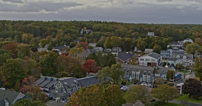 Ogunquit Maine Aerial v6 cinematic low level flyover intown capturing cozy townscape with river inlet and white sandy beach during autumn season - Shot with Inspire 2, X7 camera - October 2021