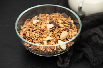 muesli with nuts and chocolate in th bowl