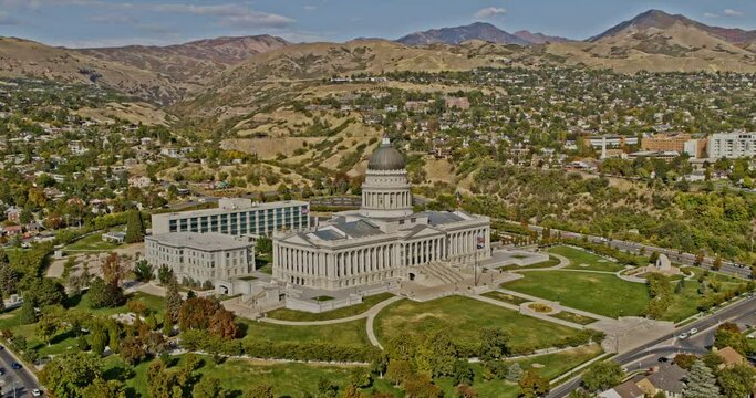 Salt Lake City Utah Aerial v3 panoramic view drone fly around state capitol building with hillside residential and spectacular mountain landscape - Shot with Inspire 2, X7 camera - October 2021