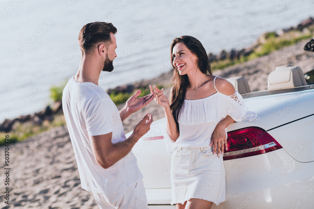 Poster Photo of pretty cute boyfriend girlfriend dressed casual outfit discussing driving cabriolet outdoors countryside