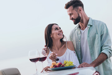 Photo of charming cute boyfriend girlfriend dressed casual outfit celebrating anniversary outdoors countryside