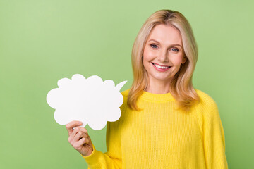 Photo of positive lady hold paper mind cloud banner advertise information wear sweater isolated...