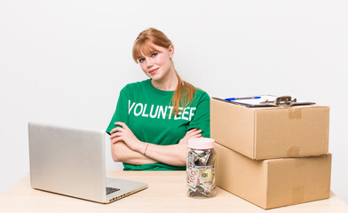 red head pretty woman volunteer and donation concept