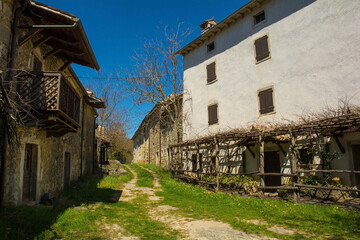 Old residential buildings in the historic little medieval village of Kotli near Buzet in Istria, western Croatia
