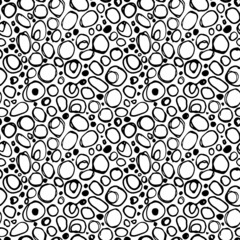 Circular doodles vector seamless pattern. Hand drawn vector ink background. Abstract fizzy water background. Linear irregular bubbles. Black ink circles. Stylish monochrome doodles. Blots and dots.