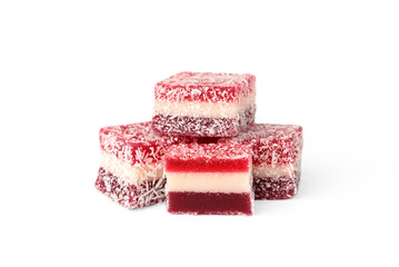 Fruit color marmalade with cherry flavor and sprinkled coconut isolated on white background.