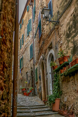 Fototapeta na wymiar Narrow alley in small Italian town
