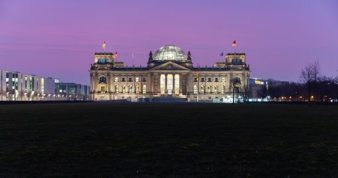 4k sunrise time lapse of the german parliament building with sahara dust in the air. Reichstag in central berlin
