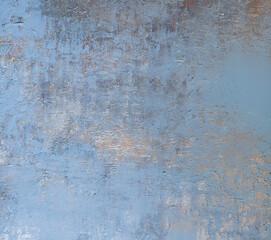 wall with blue weathered old paint