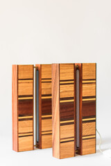 minimalistic handmade retro lamps made of wood on a white background isolated