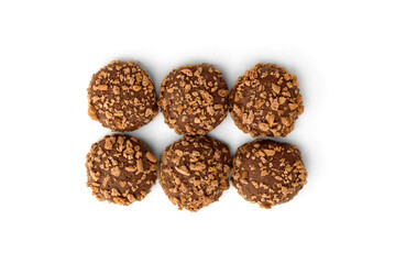 Shortbread cookies in milk chocolate glaze and crumbs isolated on white background.