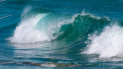 giant waves in blue ocean