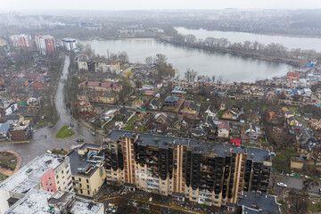 The aerial view of the destroyed and burnt buildings. The buildings were destroyed by russian...