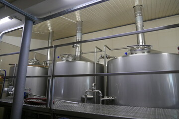 stainless steel pots in brewery