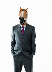 Businessman with head of horse on white background
