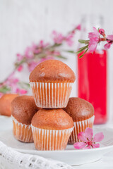 Breakfast with fresh vanilla muffins and juice.