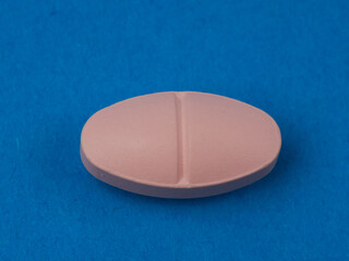 pharmaceutical over-the-counter or prescription pills, on a blue background