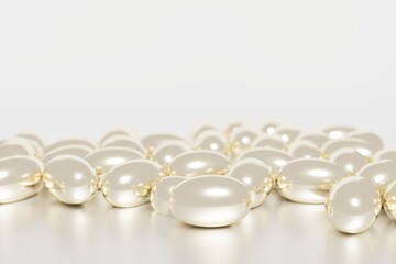 3d render of shiny gold glossy capsules with vitaminsl or beauty serum for your project