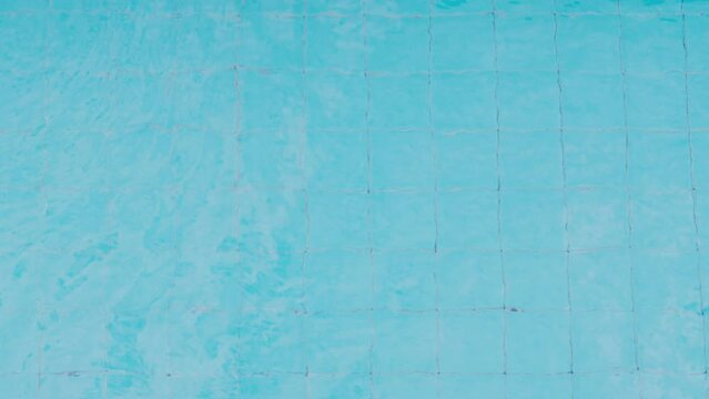 Pool water pattern. Top view of the swimming pool with blue water