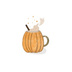 coffee in an orange pumpkin-shaped mug with a cinnamon stick