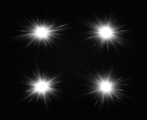 Shining silver stars isolated on black background. The star burst with brilliance. Glow effect.