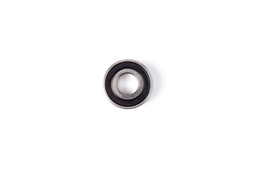 Ball bearing isolated on white background. Metal roller bearing. Super Precision Ball Bearings used in high performance machinery.