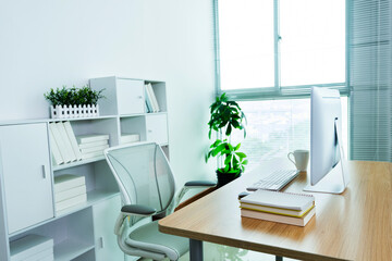 Fototapeta na wymiar Modern workspace with computer and chair