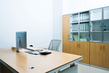 Modern workspace with computer and chair